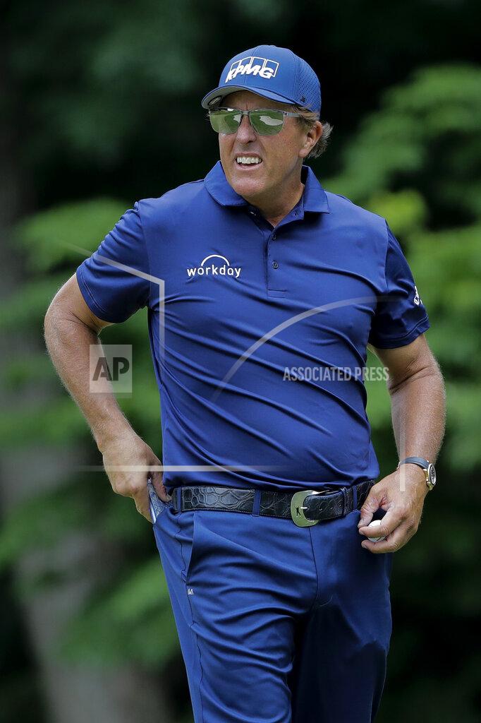 Frank Franklin Ii Phil Mickelson looks on after putting on the 14th green during the second round of the Travelers Championship golf tournament at TPC River Highlands, Friday, June 26, 2020, in Cromwell, Conn. (AP Photo/Frank Franklin II)