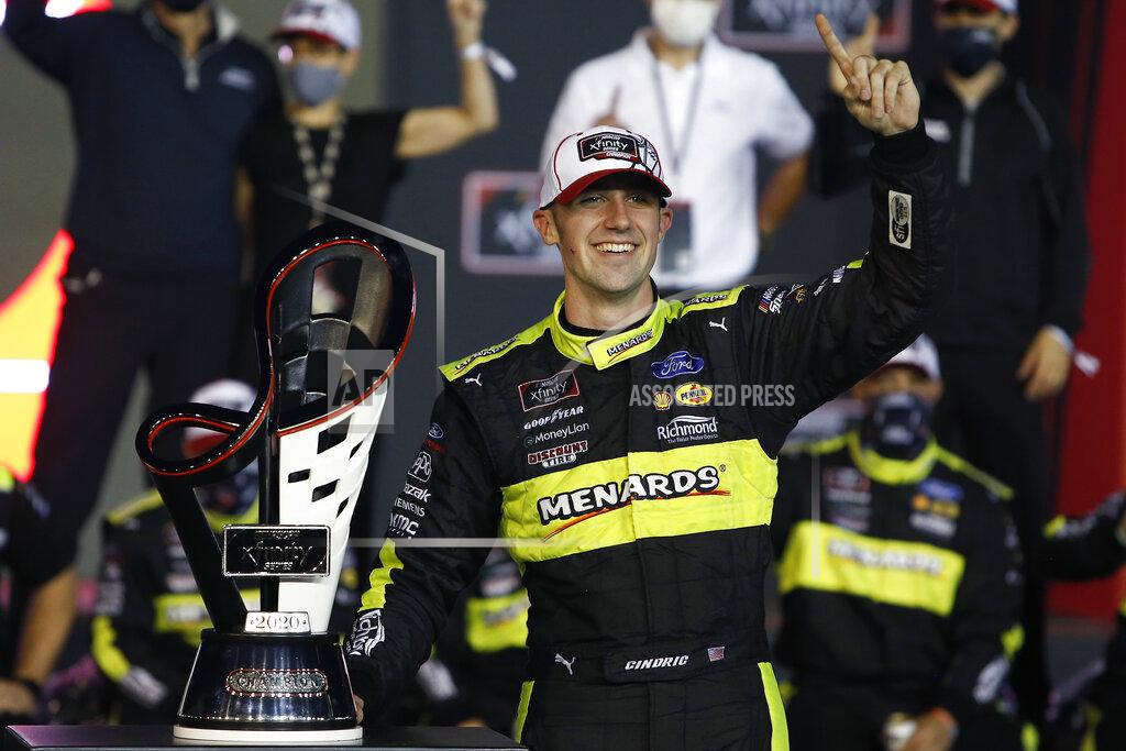 Ralph Freso Austin Cindric celebrates in Victory Lane with the season championship trophy after winning the NASCAR Xfinity Series auto race at Phoenix Raceway, Saturday, Nov. 7, 2020, in Avondale, Ariz. (AP Photo/Ralph Freso)