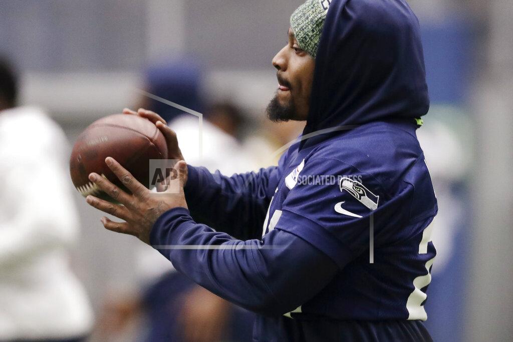 Elaine Thompson Seattle Seahawks running back Marshawn Lynch catches a football during warmups at the NFL team's practice facility Tuesday, Dec. 24, 2019, in Renton, Wash. When Lynch played his last game for the Seahawks in 2016, the idea of him ever wearing a Seahawks uniform again seemed preposterous. Yet, here are the Seahawks getting ready to have Lynch potentially play a major role Sunday against San Francisco with the NFC West title on the line. (AP Photo/Elaine Thompson)