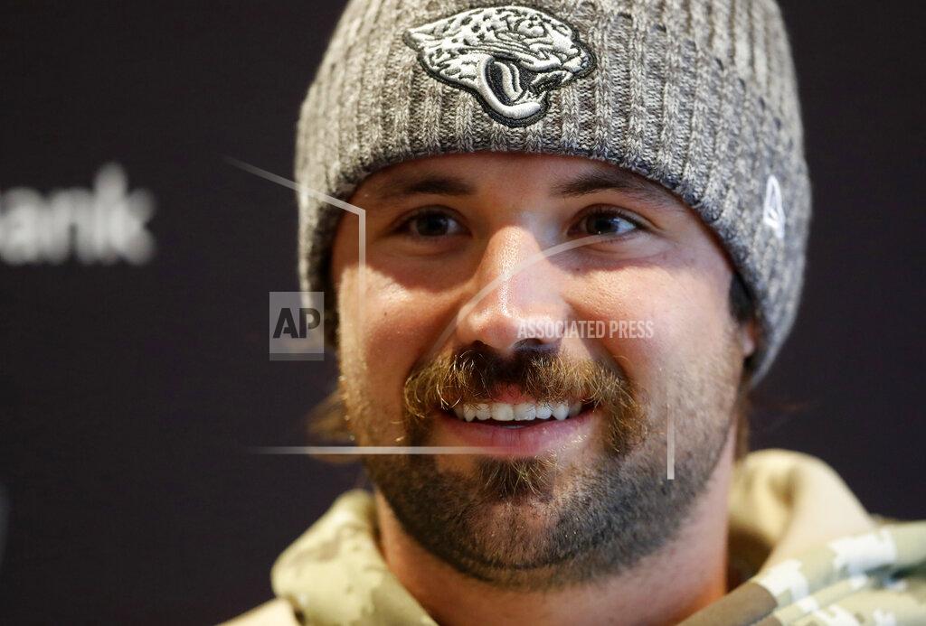 Frank Augstein Jaguars QB Gardner Minshew II speaks during a NFL press conference of the Jacksonville Jaguars at the at Allianz Park in London, Friday, Nov. 1, 2019.The Jacksonville Jaguars are preparing for an NFL regular season game against the Houston Texans in London on Sunday. (AP Photo/Frank Augstein)