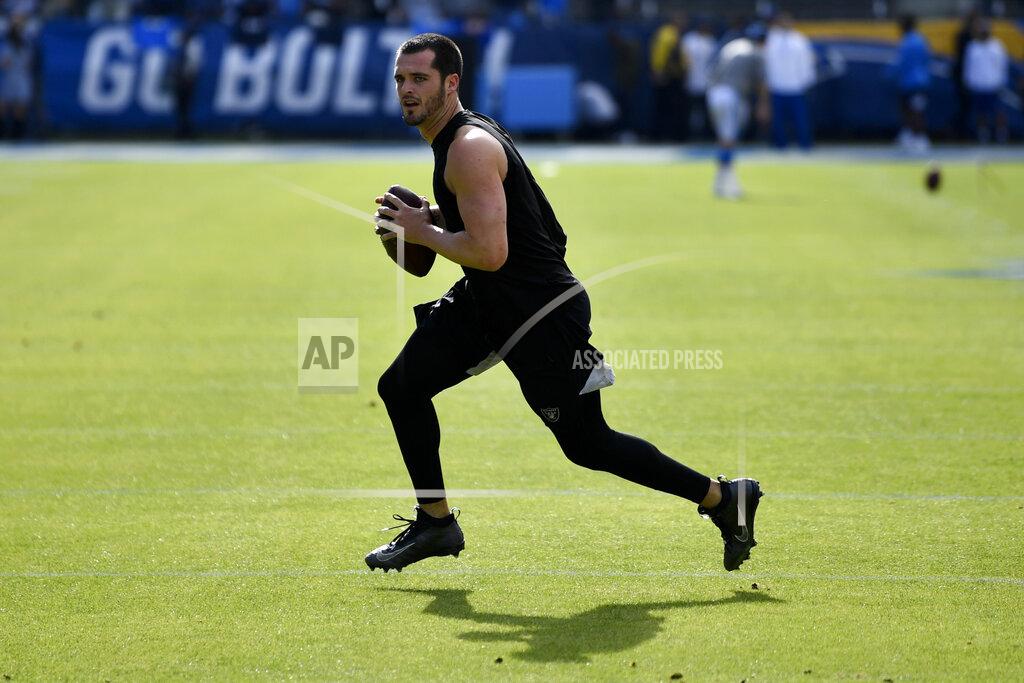 Kelvin Kuo FILE - In this Dec. 22, 2019, file photo, Oakland Raiders quarterback Mike Glennon warms up before an NFL football game against the Los Angeles Chargers in Carson, Calif. The Jacksonville Jaguars have agreed to terms with journeyman quarterback Mike Glennon, giving them a veteran backup behind Gardner Minshew.(AP Photo/Kelvin Kuo, File)