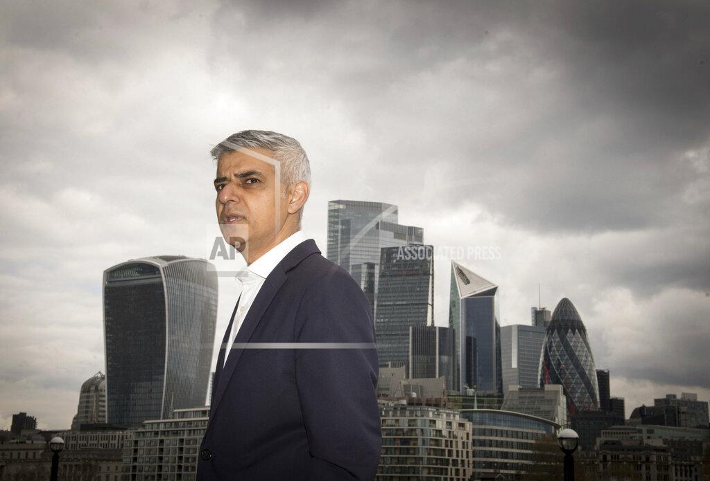 Stefan Rousseau The Mayor of London, Sadiq Khan stands near City Hall on the South Bank of the Thames in London on Thursday April 29, 2021. On May 6, Londoners will elect a mayor, whose performance will help determine whether this is the start of a period of decline for Europe's biggest city — or a chance to do things better. Current Mayor Sadiq Khan, who is favored to win re-election, says his top priority is preserving jobs threatened by the economic blow of the pandemic. Rival Shaun Bailey says his top priority is crime. (Stefan Rousseau/PA via AP)