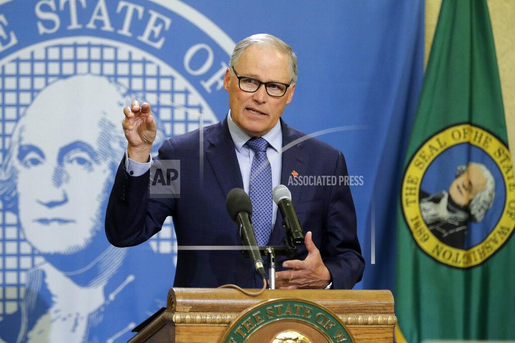 FILE - In this Monday, April 13, 2020, file photo, Washington Gov. Jay Inslee speaks during a news conference at the Capitol in Olympia, Wash. Inslee has repeatedly said he will rely on scientific models and input from state health officials to determine when stay-at-home orders can be relaxed, despite growing calls for them to be ended, including a protest that drew about 2,500 to the state Capitol. (AP Photo/Ted S. Warren, File)