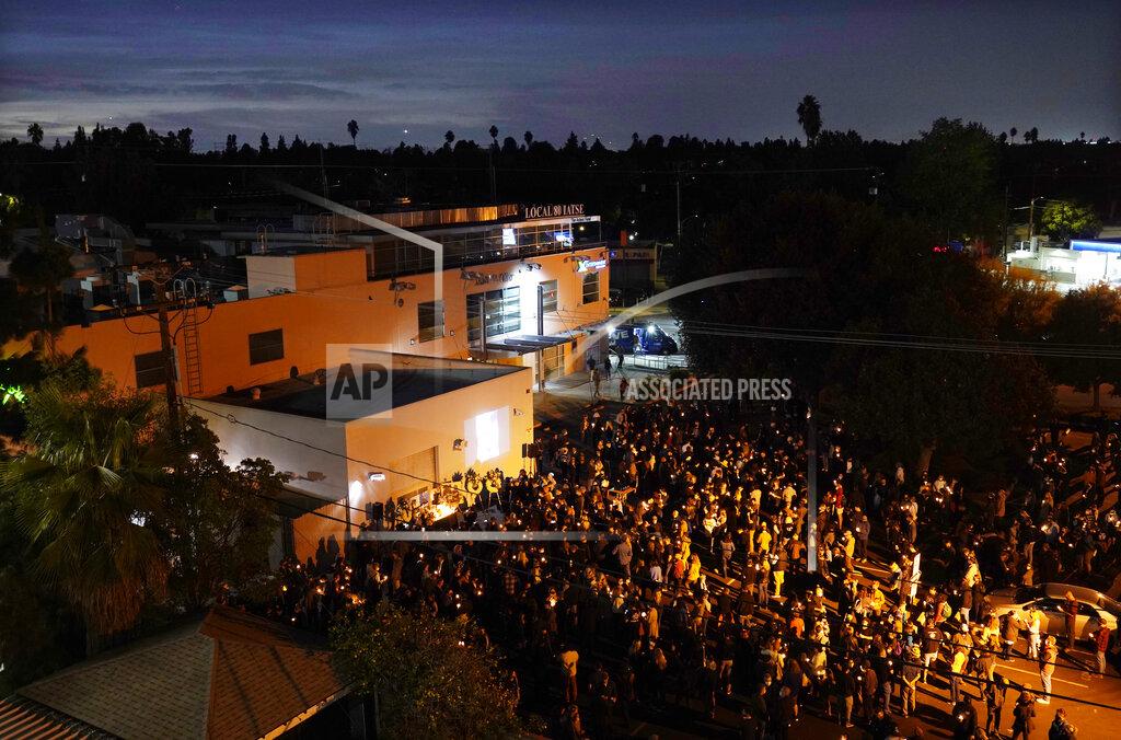 Chris Pizzello Attendees gather in the hundreds for a candlelight vigil for the late cinematographer Halyna Hutchins, Sunday, Oct. 24, 2021, in Burbank, Calif. A prop firearm discharged last Thursday by actor Alec Baldwin, while producing and starring in a Western movie in Santa Fe, N.M., killed Hutchins and wounded director Joel Souza. (AP Photo/Chris Pizzello)