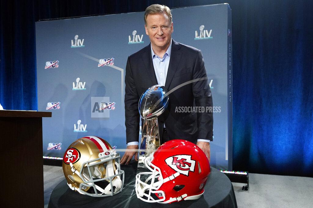 NFL Commissioner Roger Goodell poses with the Vince Lombardi Trophy after a news conference for the NFL Super Bowl 54 football game Wednesday, Jan. 29, 2020, in Miami. (AP Photo/David J. Phillip)
