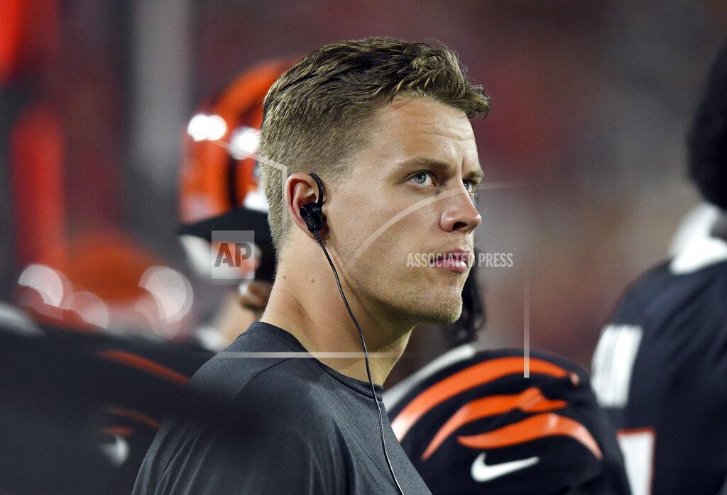 Jason Behnken Cincinnati Bengals quarterback Joe Burrow (9) watches from the sidelines during the first half of an NFL preseason football game against the Tampa Bay Buccaneers Saturday, Aug. 14, 2021, in Tampa, Fla. (AP Photo/Jason Behnken)