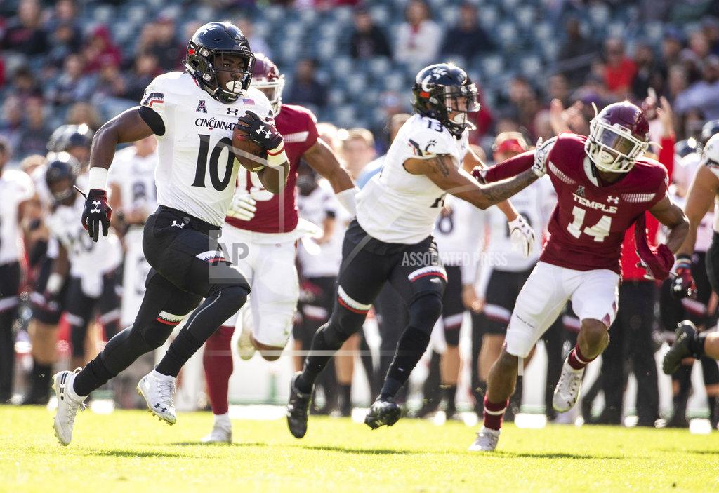 Chris Szagola Cincinnati's running back Charles McClelland (10) runs the ball in for a touchdown during the second half of an NCAA college football against Temple, Saturday, Oct. 20, 2018, in Philadelphia. Temple won 24-17 in overtime. (AP Photo/Chris Szagola)