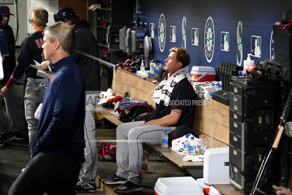 Elaine Thompson Cleveland Indians starting pitcher Zach Plesac sits in the dugout after the sixth inning of the team's baseball game against the Seattle Mariners on Thursday, May 13, 2021, in Seattle. (AP Photo/Elaine Thompson)