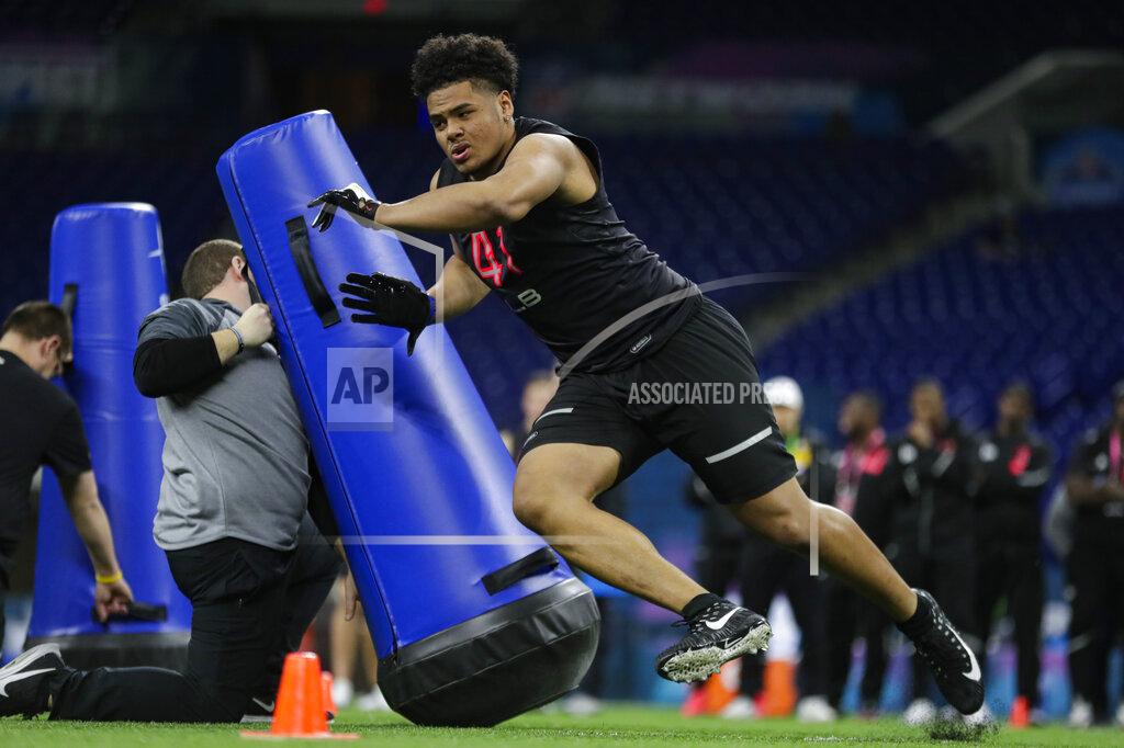 Michael Conroy Boise State linebacker Curtis Weaver runs a drill at the NFL football scouting combine in Indianapolis, Saturday, Feb. 29, 2020. (AP Photo/Michael Conroy)