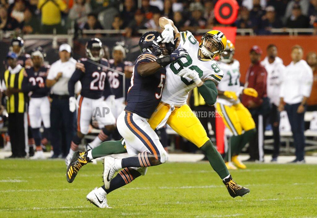 Charles Rex Arbogast Chicago Bears' Roquan Smith is called for pass interference on Green Bay Packers' Jimmy Graham during the second half of an NFL football game Thursday, Sept. 5, 2019, in Chicago. (AP Photo/Charles Rex Arbogast)