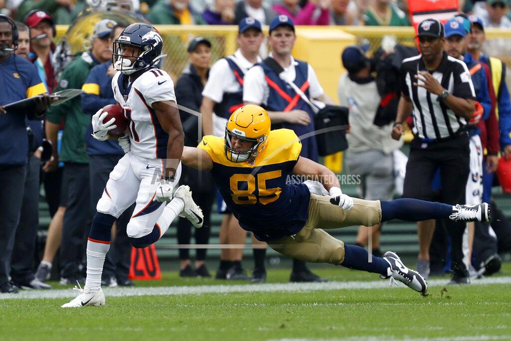 Matt Ludtke Denver Broncos wide receiver Diontae Spencer, left, runs past Green Bay Packers tight end Robert Tonyan (85) during the first half of an NFL football game Sunday, Sept. 22, 2019, in Green Bay, Wis. (AP Photo/Matt Ludtke)