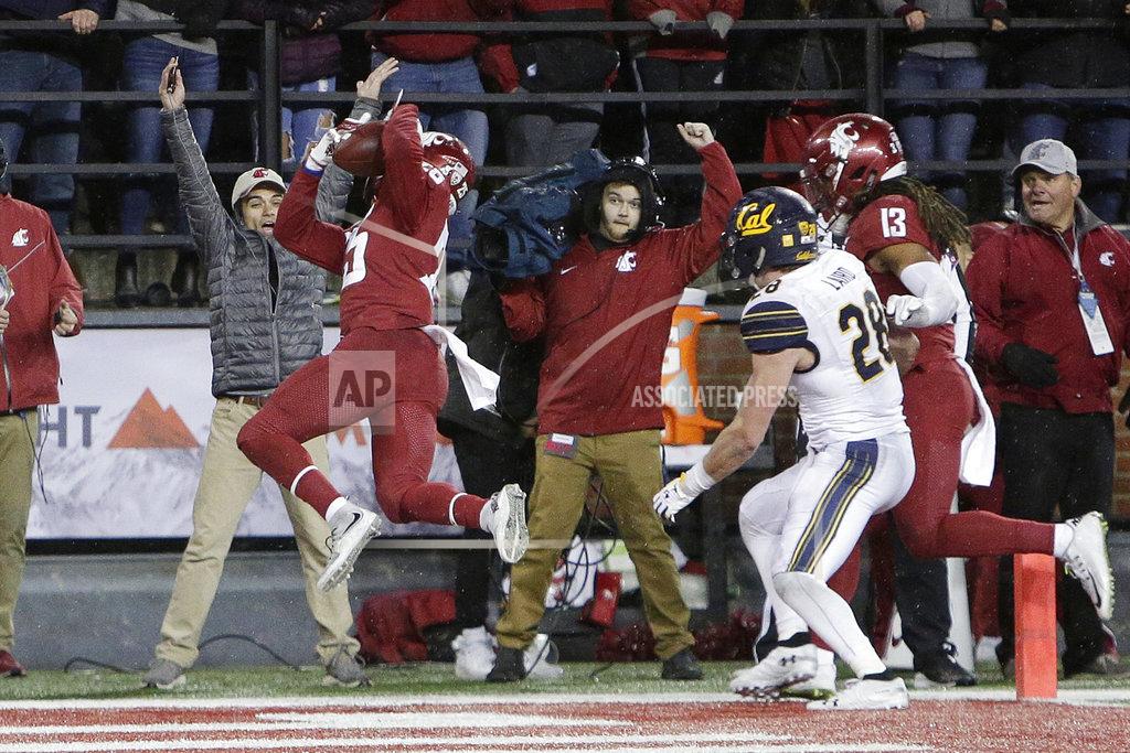 Young Kwak Washington State safety Skyler Thomas, left, intercepts a California pass during the second half of an NCAA college football game in Pullman, Wash., Saturday, Nov. 3, 2018. Washington State won 19-13. (AP Photo/Young Kwak)