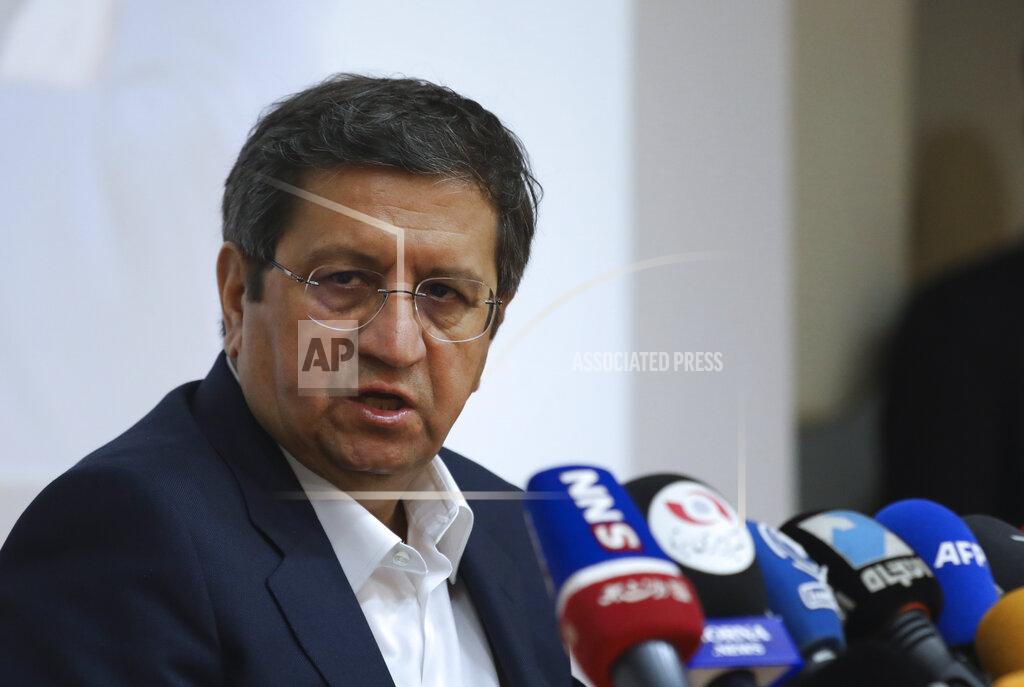 Vahid Salemi Former Iranian Central Bank chief Abdolnasser Hemmati, one of the seven candidates allowed on the ballot for Friday’s presidential election, gives a press conference, in Tehran, Iran, Tuesday, June 15, 2021. Hemmati appealed Tuesday for better economic and political relations with the West, his most extensive attempt yet to attract reformist voters just days ahead of the poll. (AP Photo/Vahid Salemi)