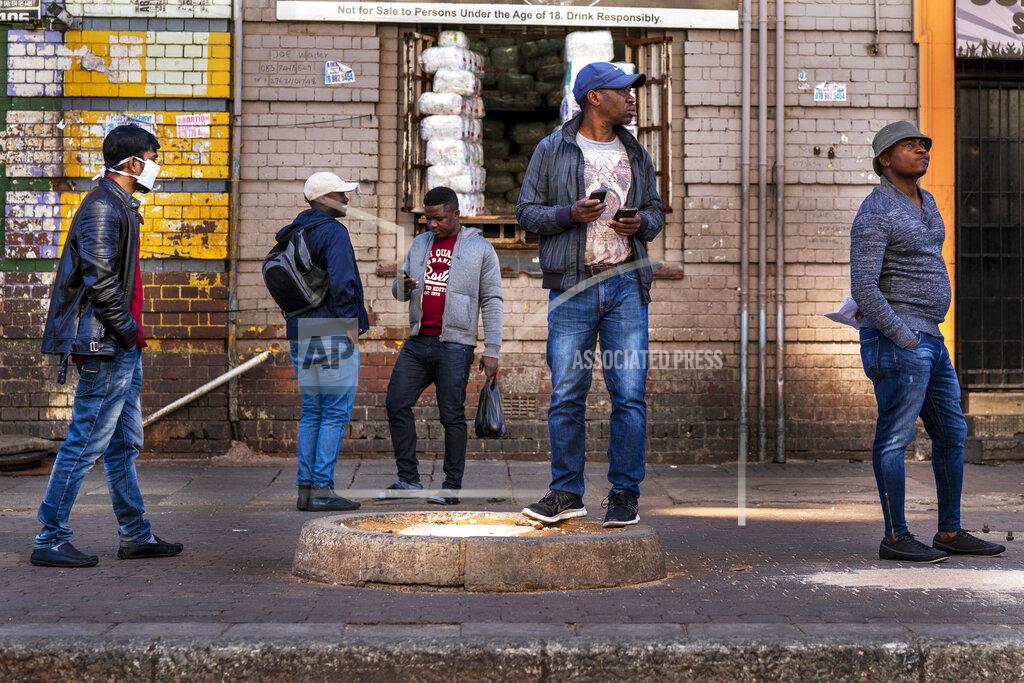 Jerome Delay Residents lineup to be tested for COVID-19 as well as HIV and Tuberculosis in downtown Johannesburg Thursday, April 30, 2020. Thousands are being tested in an effort to derail the spread of coronavirus. South Africa will began a phased easing of its strict lockdown measures on May 1, although its confirmed cases of coronavirus continue to increase. (AP Photo/Jerome Delay)
