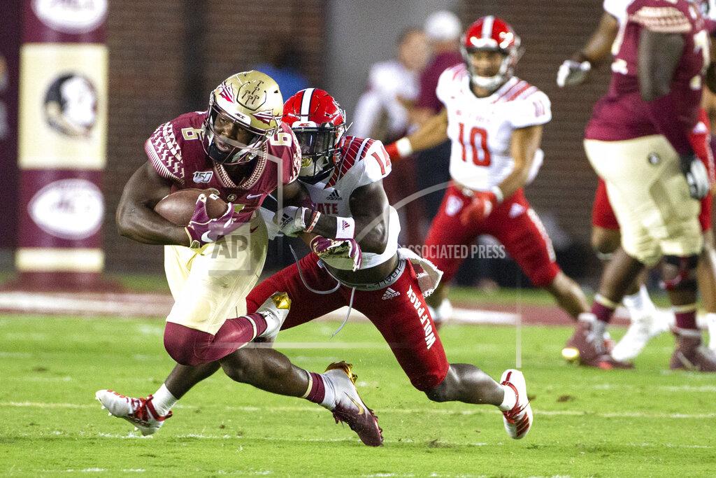Mark Wallheiser Florida State tight end Tre' McKitty (6) is brought down by North Carolina State safety De'Von Graves (14) in the first half of an NCAA college football game in Tallahassee, Fla., Saturday, Sept. 28, 2019. (AP Photo/Mark Wallheiser)