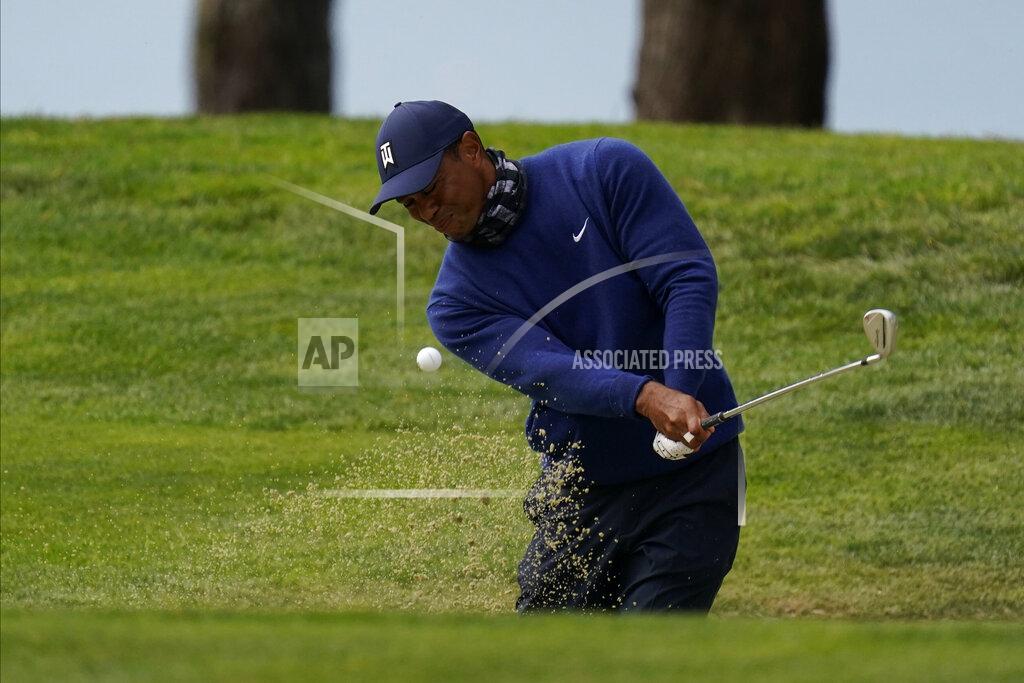 Jeff Chiu Tiger Woods hits from the bunker on the 14th hole during the first round of the PGA Championship golf tournament at TPC Harding Park Thursday, Aug. 6, 2020, in San Francisco. (AP Photo/Jeff Chiu)