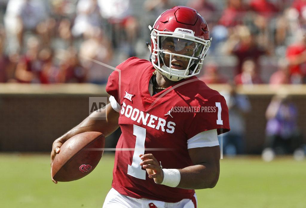 Sue Ogrocki FILE - In this Sept. 1, 2018, file photo, Oklahoma quarterback Kyler Murray (1) carries the ball in the first half of an NCAA college football game against Florida Atlantic, in Norman, Okla. Murray was named a Heisman Trophy finalist on Monday, Dec. 3, 2018. (AP Photo/Sue Ogrocki, File)