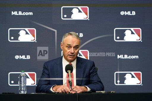 FILE - Major League Baseball commissioner Rob Manfred speaks during a news conference in Arlington, Texas, Thursday, Dec. 2, 2021. Major League Baseball and the players’ association are scheduled to meet Thursday, Jan. 13, 2022, in the first negotiations between the parties since labor talks broke off Dec. 1. The planning of the meeting was disclosed to The Associated Press by a person familiar with the negotiations who spoke on condition of anonymity because no announcement was made. (AP Photo/LM Otero, File)