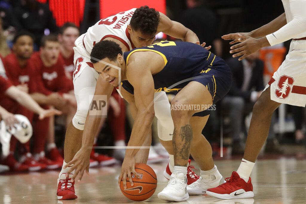 Jeff Chiu California guard Matt Bradley, front, reaches for the ball in front of Stanford forward Oscar da Silva during the first half of an NCAA college basketball game in Stanford, Calif., Thursday, Jan. 2, 2020. (AP Photo/Jeff Chiu)