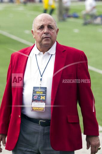 Tony Ding FILE - Wisconsin athletic director Barry Alvarez is shown on the field before an NCAA college football game against Michigan at Michigan Stadium in Ann Arbor, Mich., in this Saturday, Oct. 1, 2016, file photo. Wisconsin athletic director Barry Alvarez is retiring after a three-decade run in which he transformed the university’s football program and later guided the Badgers to their greatest all-around sports success in the school’s history. Alvarez announced Tuesday, April 6, 2021, he would retire on June 30.(AP Photo/Tony Ding, File)