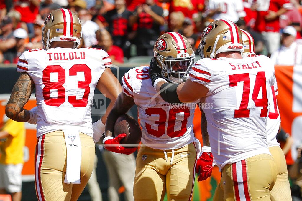 Frank Victores San Francisco 49ers running back Jeffrey Wilson (30) celebrates his touchdown during the first half an NFL football game against the Cincinnati Bengals, Sunday, Sept. 15, 2019, in Cincinnati. (AP Photo/Frank Victores)