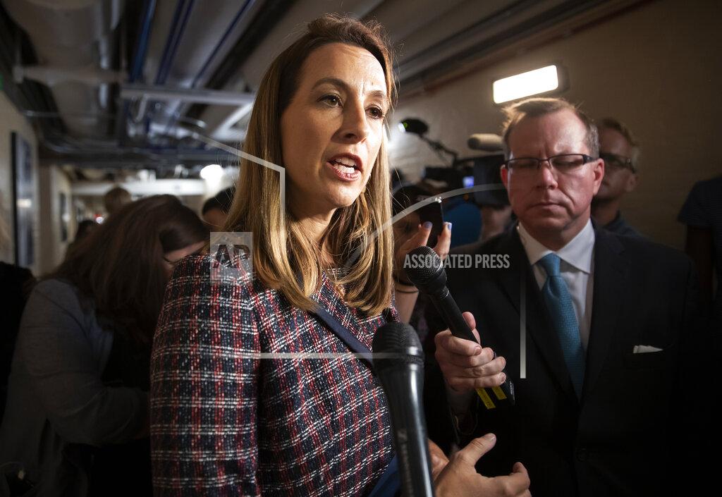J. Scott Applewhite FILE - Rep. Mikie Sherrill, D-N.J., talks to reporters, Tuesday Sept. 24, 2019, on Capitol in Washington. Sherrill will face Republican Rosemary Becchi for New Jersey's 11th Congressional District in the 2020 election. (AP Photo/J. Scott Applewhite, File)