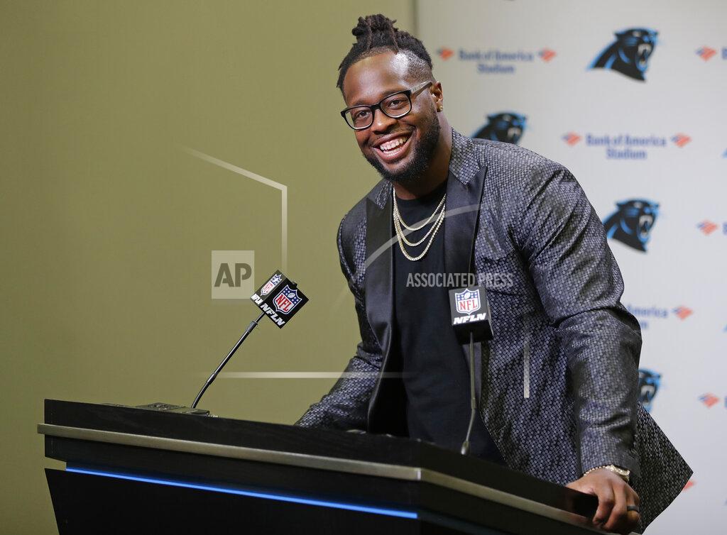 Chuck Burton Carolina Panthers NFL football player Gerald McCoy answers a question during a news conference in Charlotte, N.C., Tuesday, June 4, 2019. After nine productive seasons with the Tampa Bay Buccaneers, the six-time Pro Bowl and three-time All-Pro defensive tackle McCoy signed with the Panthers. (AP Photo/Chuck Burton)