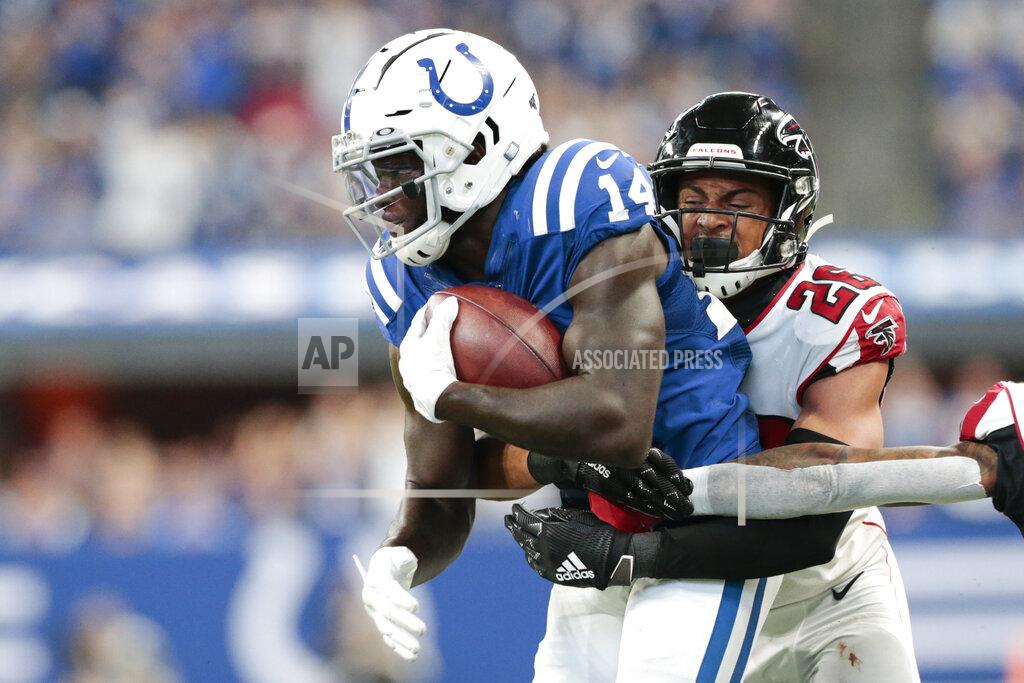 Aj Mast Indianapolis Colts wide receiver Zach Pascal (14) is tacked by Atlanta Falcons cornerback Isaiah Oliver (26) during the second half of an NFL football game, Sunday, Sept. 22, 2019, in Indianapolis. (AP Photo/AJ Mast)