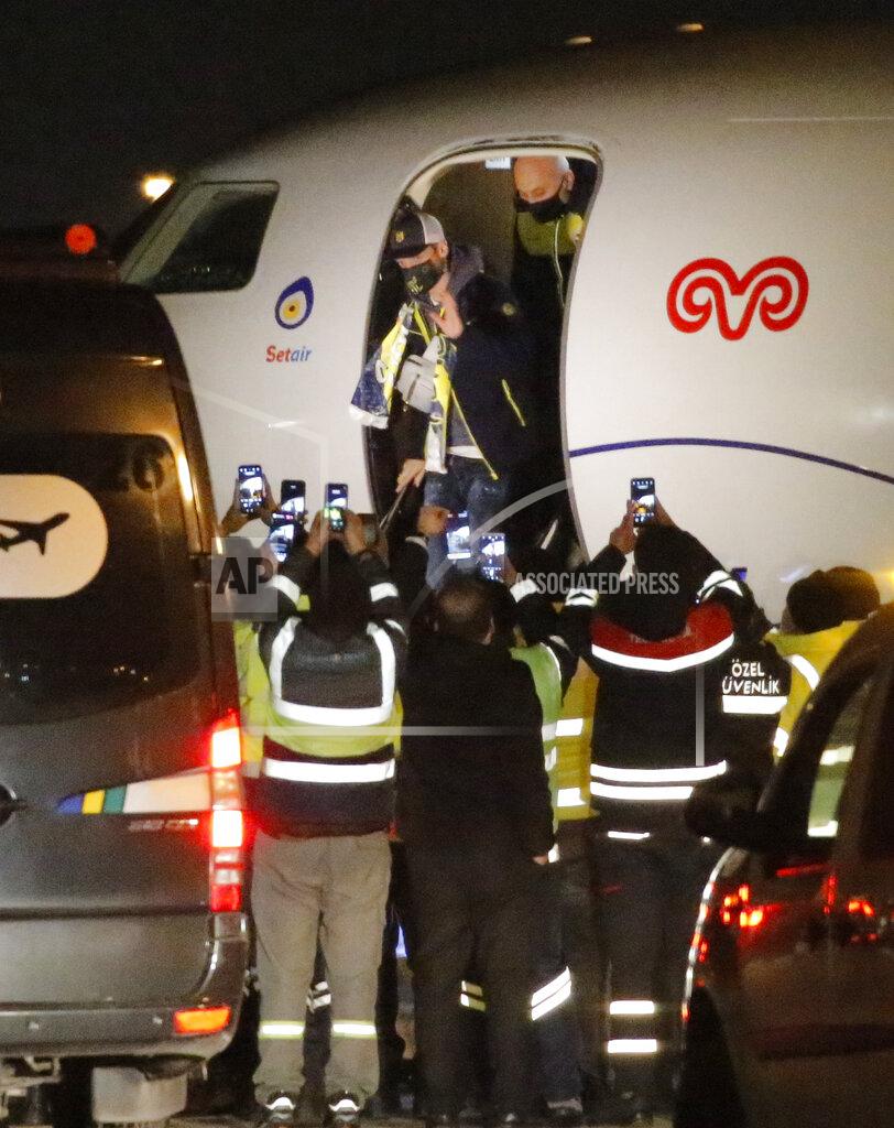 Uncredited Mesut Ozil, former Germany midfielder disembarks a private jet after arriving at the Ataturk Airport in Istanbul, early Monday, Jan. 18, 2021. Ozil, who is of Turkish descent, will look to reignite his career in Turkey after he left Arsenal to join Fenerbahce. (AP Photo)