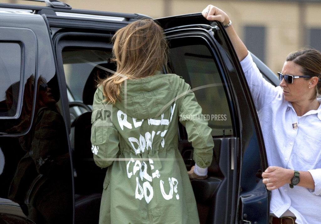 Andrew Harnik FILE - In this June 21, 2018 file photo, first lady Melania Trump arrives at Andrews Air Force Base, Md. wearing a Zara jacket that reads, "I don't really care. Do U?" after visiting the Upbring New Hope Children Center run by the Lutheran Social Services of the South in McAllen, Texas. (AP Photo/Andrew Harnik, File)