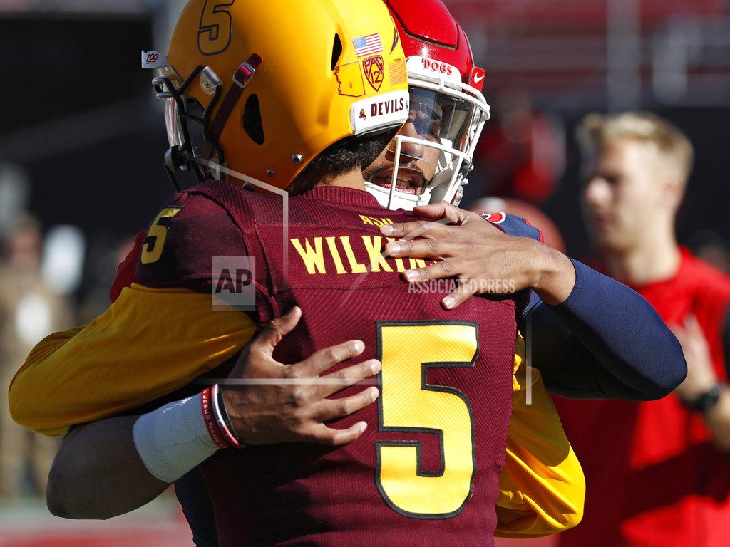 John Locher Fresno State quarterback Marcus McMaryion, right, embraces Arizona State quarterback Manny Wilkins (5) before the Las Vegas Bowl NCAA college football game, Saturday, Dec. 15, 2018, in Las Vegas. (AP Photo/John Locher)