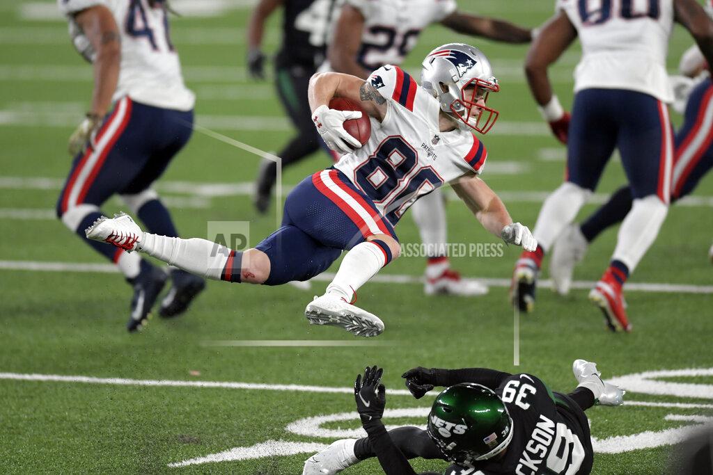 Bill Kostroun New England Patriots' Gunner Olszewski (80) tries to avoid being tackled during the first half of an NFL football game against the New York Jets, Monday, Nov. 9, 2020, in East Rutherford, N.J. (AP Photo/Bill Kostroun)