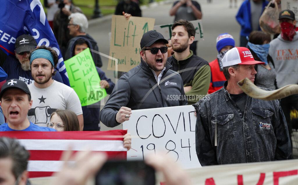 Eric Gay Protesters rally at the Texas State Capitol to speak out against Texas' handling of the COVID-19 outbreak, in Austin, Texas, Saturday, April 18, 2020. Austin and many other Texas cities remain under stay-at-home orders due to the COVID-19 outbreak except for essential personal. (AP Photo/Eric Gay)