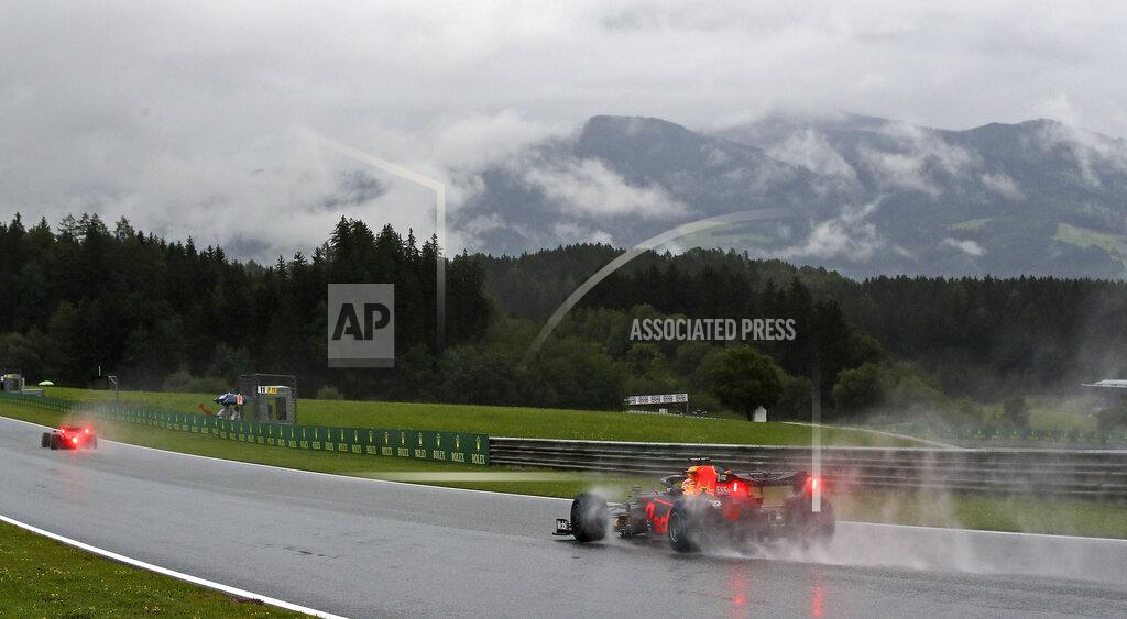 Mark Thompson Red Bull driver Max Verstappen of the Netherlands steers his car in the rain during the qualifying for the Styrian Formula One Grand Prix at the Red Bull Ring racetrack in Spielberg, Austria, Saturday, July 11, 2020. The Styrian F1 Grand Prix will be held on Sunday. (Mark Thompson/Pool via AP)
