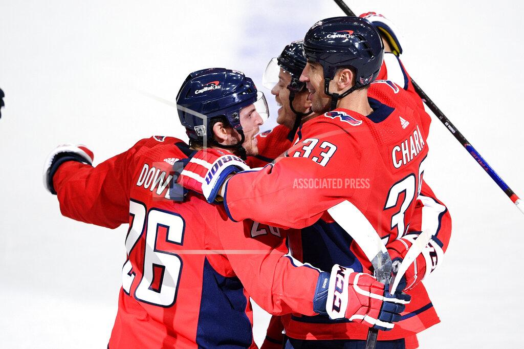 Nick Wass Washington Capitals defenseman Zdeno Chara (33) celebrates his goal with center Nic Dowd (26) during the first period of an NHL hockey game against the Boston Bruins, Monday, Feb. 1, 2021, in Washington. (AP Photo/Nick Wass)