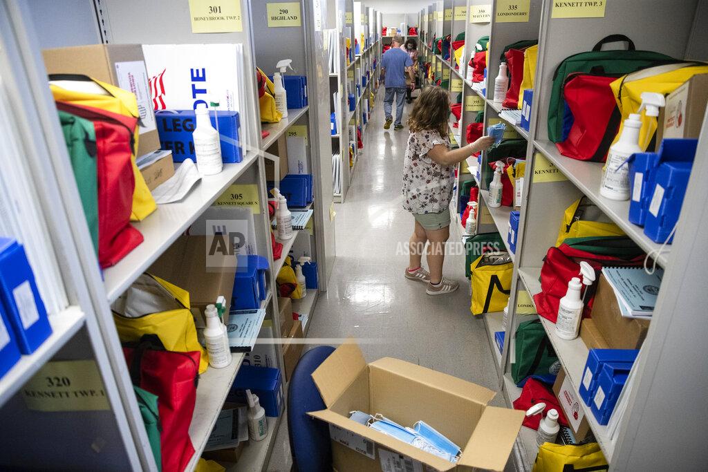 Matt Rourke Workers assemble polling place kits that include sanitation and personal perfection equipment at the Chester County Voter Services office in West Chester, Pa., prior to the primary election, Thursday, May 28, 2020. (AP Photo/Matt Rourke)
