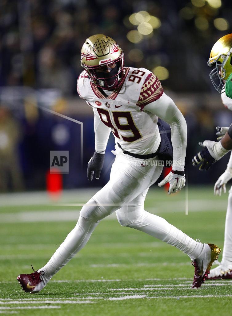 Paul Sancya FILE - In this Nov. 10, 2018, file photo, Florida State defensive end Brian Burns plays against Notre Dame in the second half of an NCAA college football game, in South Bend, Ind. Florida State's Brian Burns, Boston College's Wyatt Ray and Syracuse's Alton Robinson are tied for eighth in sacks with nine each. (AP Photo/Paul Sancya, File)