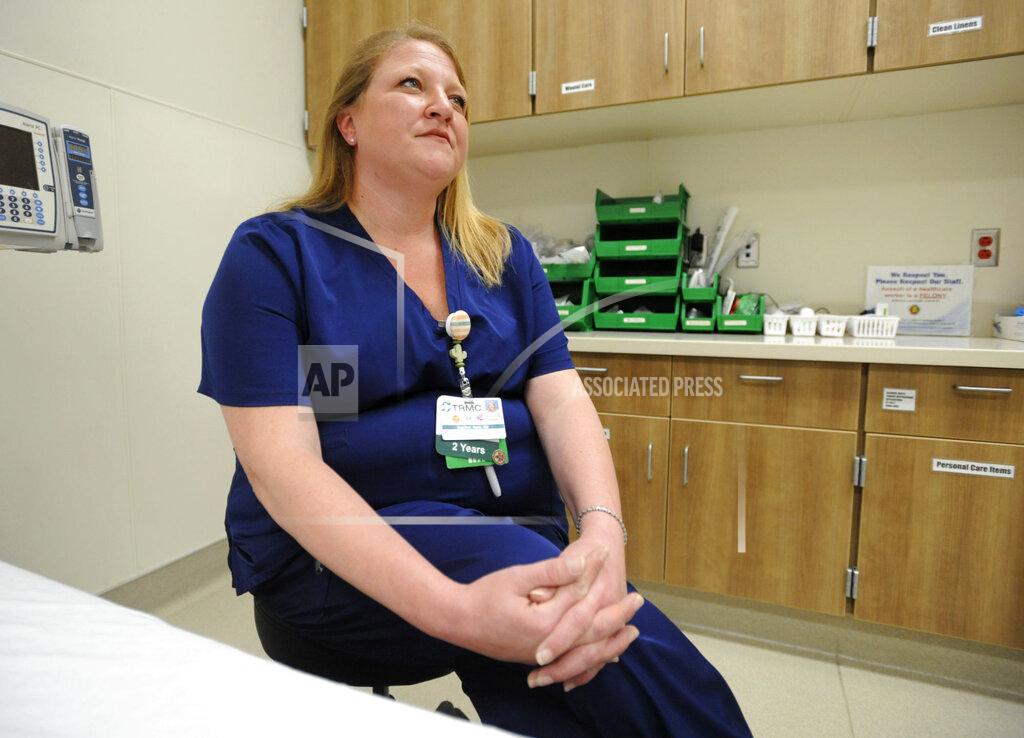 Jay Reeves Registered nurse Heather Agee is shown in a treatment room at Thomasville Regional Medical Center in Thomasville, Ala., on Tuesday, May 3, 2022. The hospital is among three in the nation that say they are missing out on federal pandemic relief money because they opened during or shortly before the COVID-19 crisis began. (AP Photo/Jay Reeves)