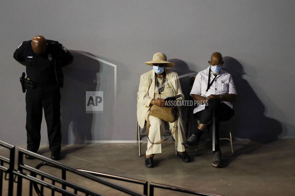 Brynn Anderson Mourners listen during a service for the late Rep. John Lewis, D-Ga., at Troy University on Saturday, July 25, 2020, in Troy, Ala. Lewis, who carried the struggle against racial discrimination from Southern battlegrounds of the 1960s to the halls of Congress, died Friday, July 17, 2020. (AP Photo/Brynn Anderson)