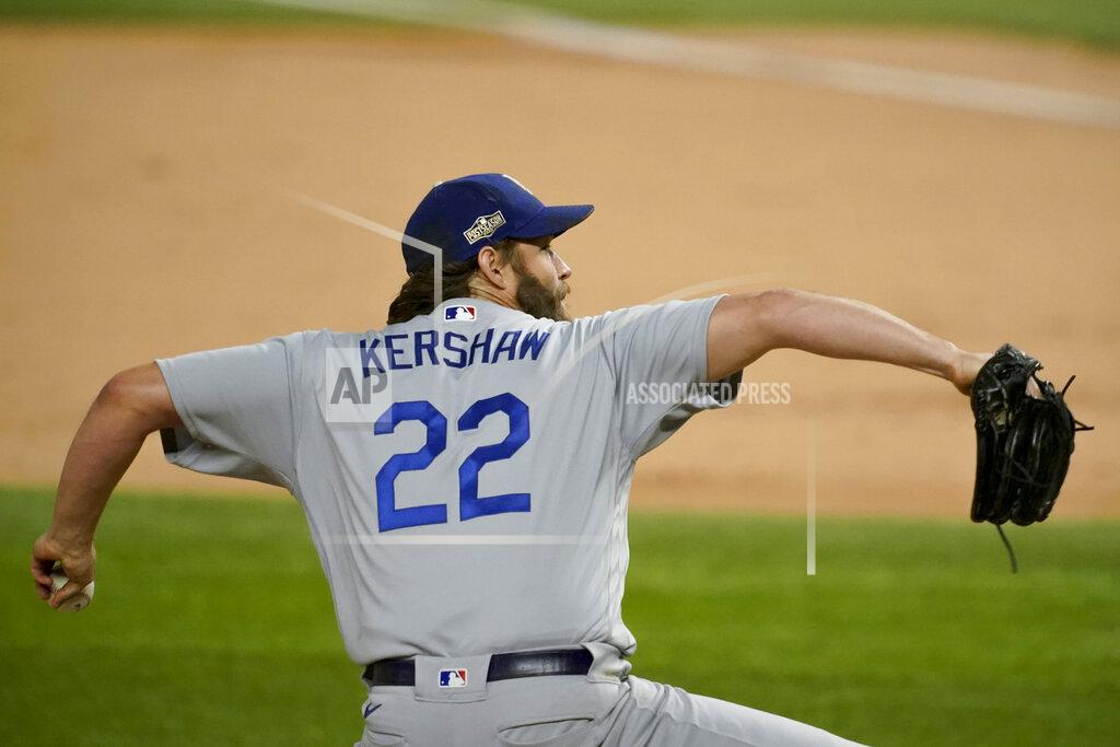 Tony Gutierrez Los Angeles Dodgers starting pitcher Clayton Kershaw throws against the Atlanta Braves during the fifth inning in Game 4 of a baseball National League Championship Series Thursday, Oct. 15, 2020, in Arlington, Texas. (AP Photo/Tony Gutierrez)