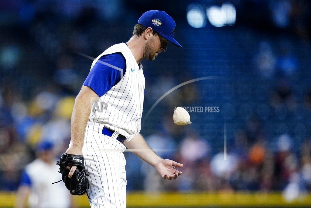 Ross D. Franklin Arizona Diamondbacks starting pitcher Tyler Gilbert flips the rosin bag during the second inning of a baseball game against the Seattle Mariners, Sunday, Sept. 5, 2021, in Phoenix. (AP Photo/Ross D. Franklin)