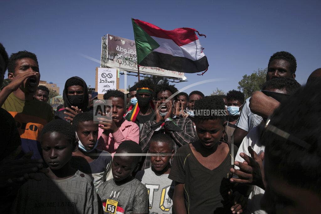 Marwan Ali Thousands of protesters take to the streets to renew their demand for a civilian government in the Sudanese capital Khartoum, Thursday, Nov. 25, 2021. The rallies came just days after the military signed a power-sharing deal with the prime minister, after releasing him from house arrest and reinstating him as head of government. The deal came almost a month after the generals orchestrated a coup. Sudan’s key pro-democracy groups and political parties have dismissed the deal as falling short of their demands for a fully civilian rule. (AP Photo/Marwan Ali)