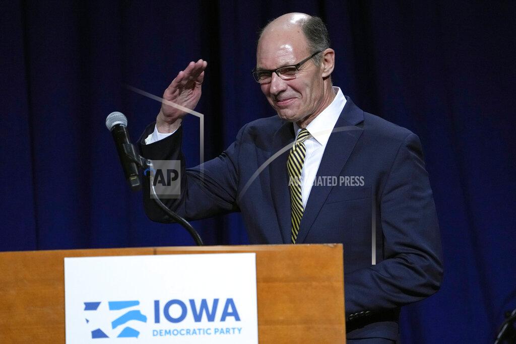 Charlie Neibergall Retired Navy Admiral Mike Franken salutes before speaking at the Iowa Democratic Party's Liberty and Justice Celebration, Saturday, April 30, 2022, in Des Moines, Iowa. (AP Photo/Charlie Neibergall)