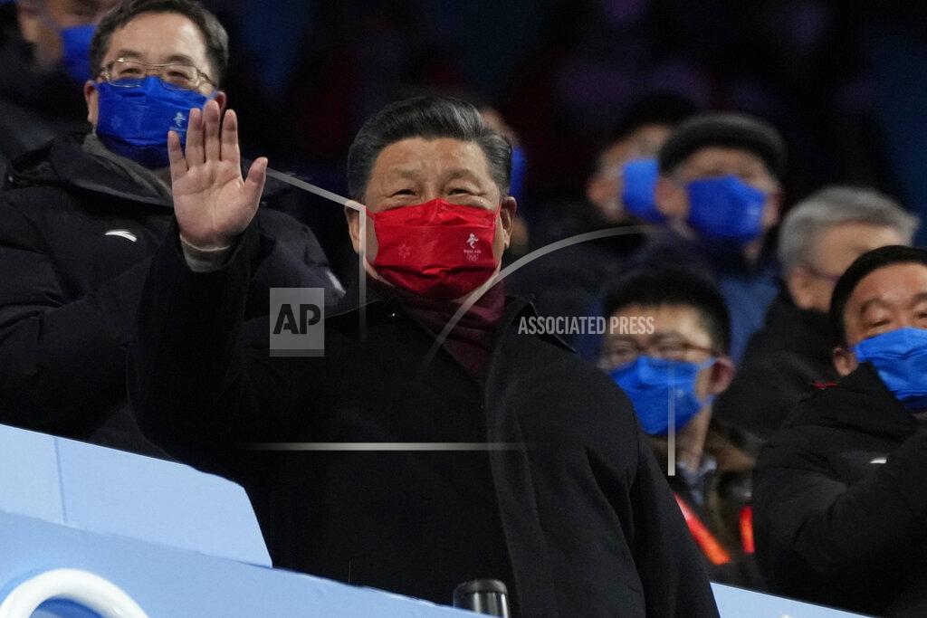 Natacha Pisarenko Chinese President Xi Jinping waves during the closing ceremony of the 2022 Winter Olympics, Sunday, Feb. 20, 2022, in Beijing. (AP Photo/Natacha Pisarenko)