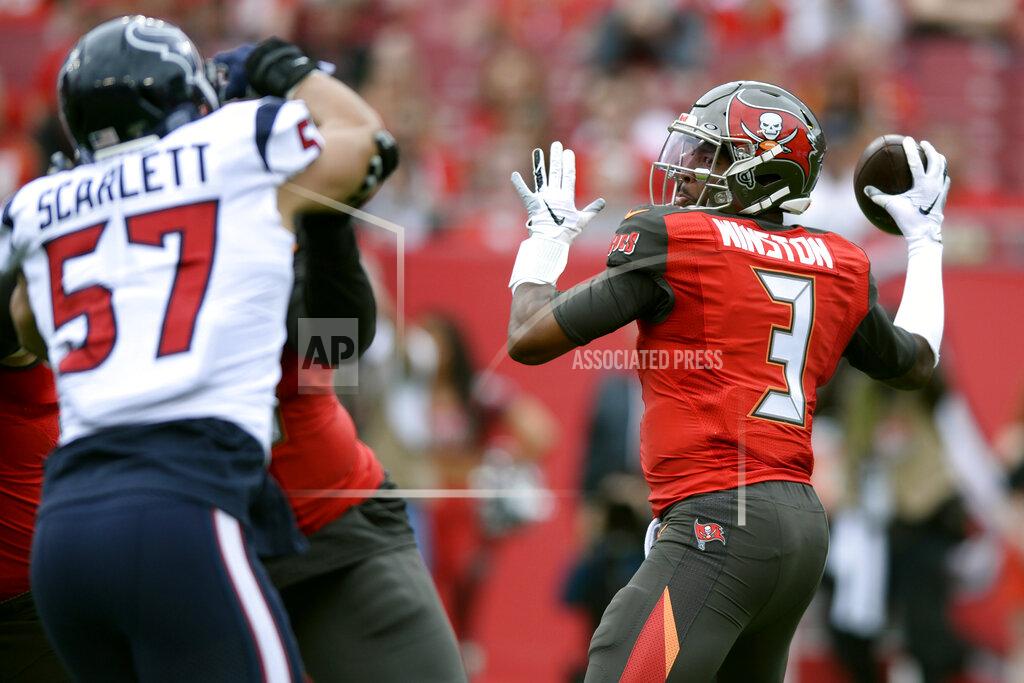 Jason Behnken FILE - In this Dec. 21, 2019, file photo, Tampa Bay Buccaneers quarterback Jameis Winston (3) throws an interception to Houston Texans cornerback Bradley Roby during the first half of an NFL football game in Tampa, Fla. Roby ran the ball back for a touchdown. Winston led the NFL with 5,107 yards passing in 2019. He also threw for 33 touchdowns and 30 interceptions to become the first 30-30 player in league history. Opponents returned a record seven interceptions for TDs last season and scored 112 points off his league-high 35 turnovers overall. (AP Photo/Jason Behnken, File)