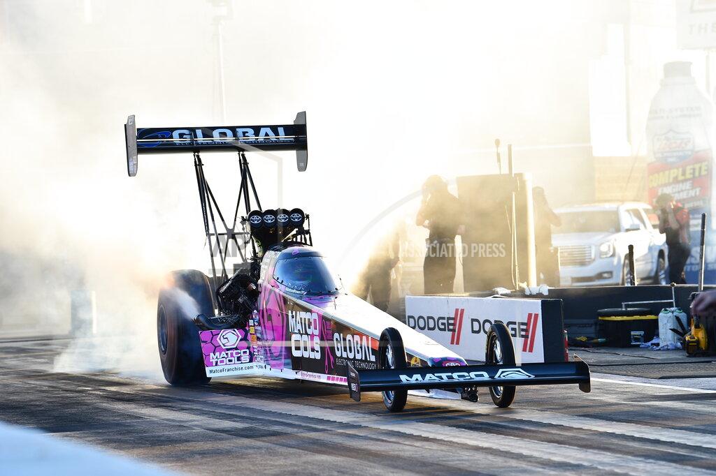 Jerry Foss In this photo provided by the NHRA, Top Fuel's Antron Brown scored his first win since 2018 when he took down the 2020 champions Steve Torrence with his 3.740-second run at 322.19 mph to cap off the Dodge NHRA Finals presented by Pennzoil, Sunday, Nov. 1, 2020, in Las Vegas. (Jerry Foss/NHRA via AP)