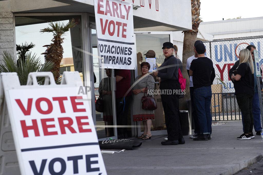 John Locher FILE - In this Feb. 15, 2020, file photo, people wait in line at an early voting location at the culinary workers union hall in Las Vegas. Nevada's Republican Party voted to censure the secretary of state, accusing her of failing to fully investigate allegations of fraud in the 2020 election. Barbara Cegavske says there was no fraud and that her own party is attacking her for refusing to "put my thumb on the scale of democracy." Cegavske, the only Republican statewide office holder in Nevada, said members of her party are disappointed with the election results and believe fraud occurred "despite a complete lack of evidence to support that belief." (AP Photo/John Locher, File)