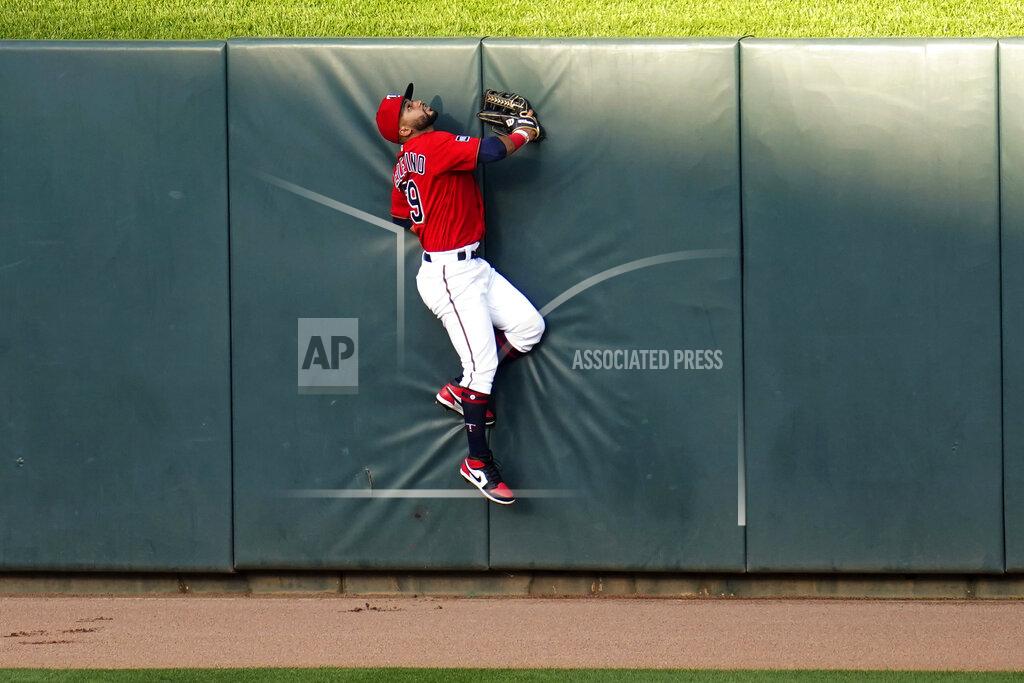Jim Mone Minnesota Twins center fielder Gilberto Celestino can only watch as the ball sails over the wall on a three-run home run by New York Yankees' Giancarlo Stanton during the first inning of a baseball game Thursday, June 10, 2021, in Minneapolis. (AP Photo/Jim Mone)