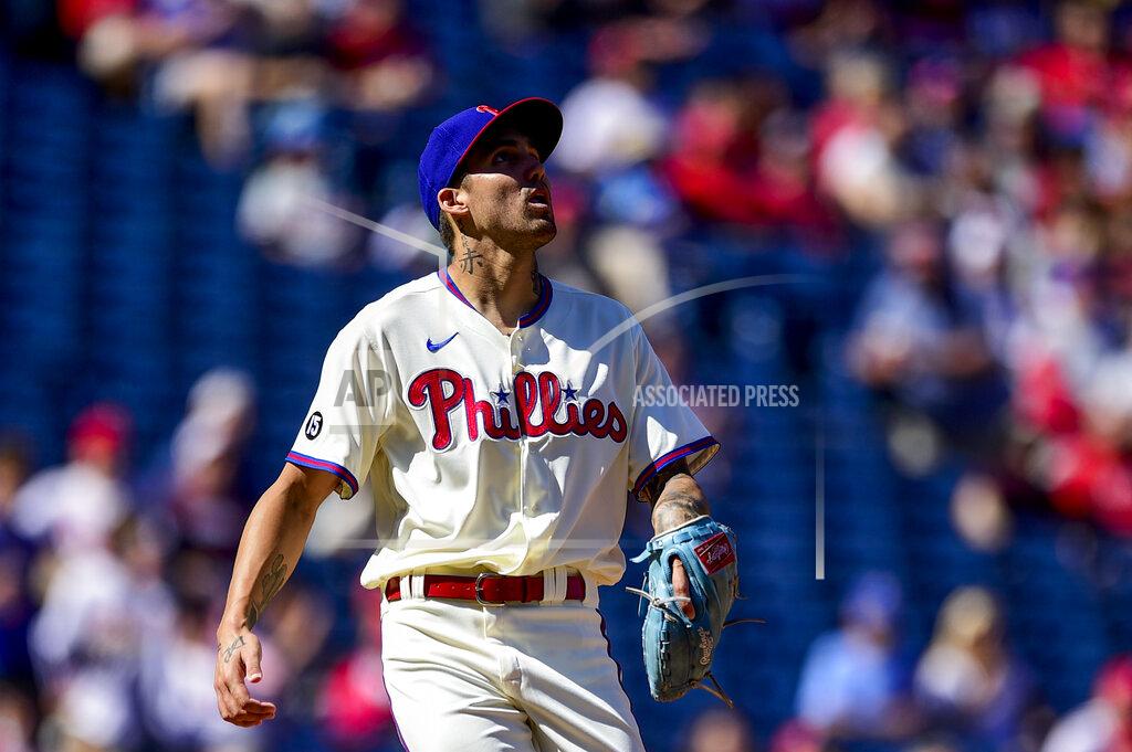 Derik Hamilton Philadelphia Phillies staring pitcher Hans Crouse watches a solo home run hit by Pittsburgh Pirates' Cole Tucker during the first inning of a baseball game, Sunday, Sept. 26, 2021, in Philadelphia. (AP Photo/Derik Hamilton)