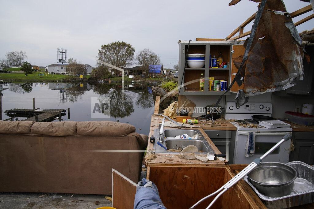 John Locher The hurricane destroyed home of Philip Adams is seen in the aftermath of Hurricane Ida, Monday, Sept. 6, 2021, in Lockport, La. (AP Photo/John Locher)